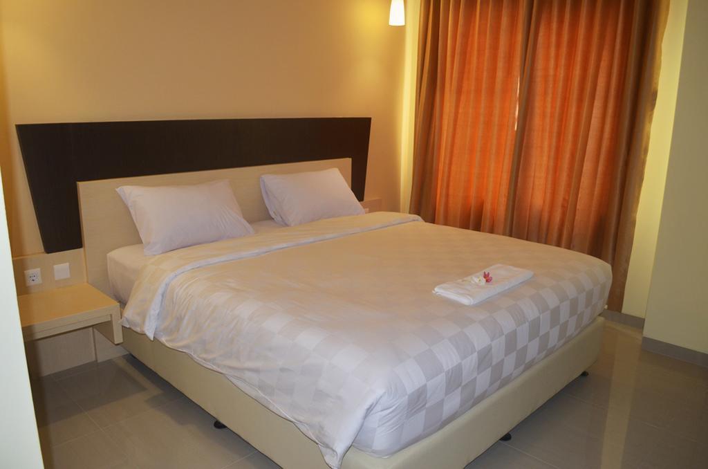 M Hotel Mataram Habitación foto