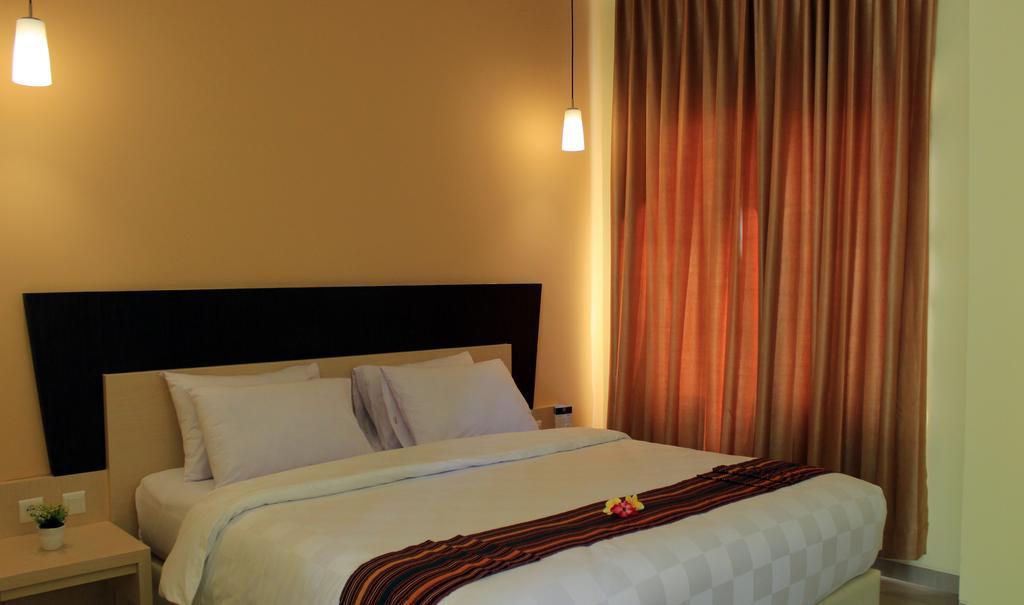 M Hotel Mataram Habitación foto