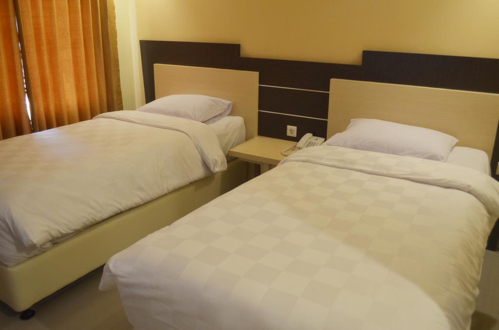 M Hotel Mataram Habitación foto